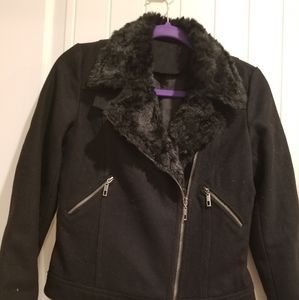 Black waist length jacket with lining and soft faux fur collar.